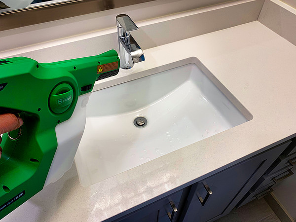 Handheld electrostatic disinfecting bathroom sink from Sanitize 4 Serenity 