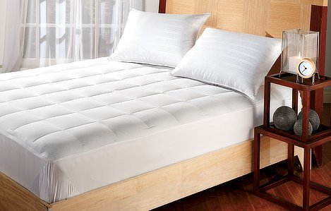 Mattress with white bed cover by Sanitize 4 Serenity 