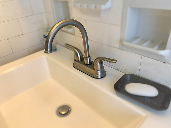 disinfecting faucet before